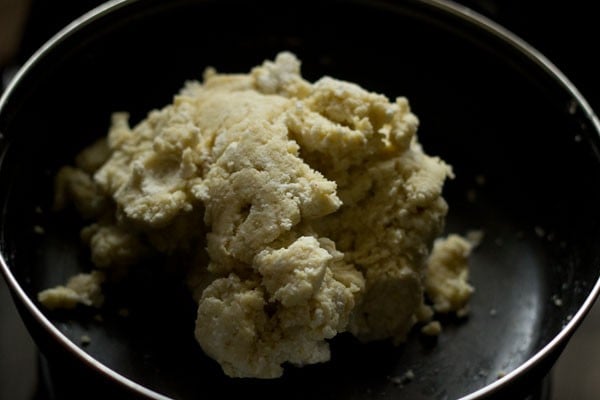 mixing and making kala jamun dough. 