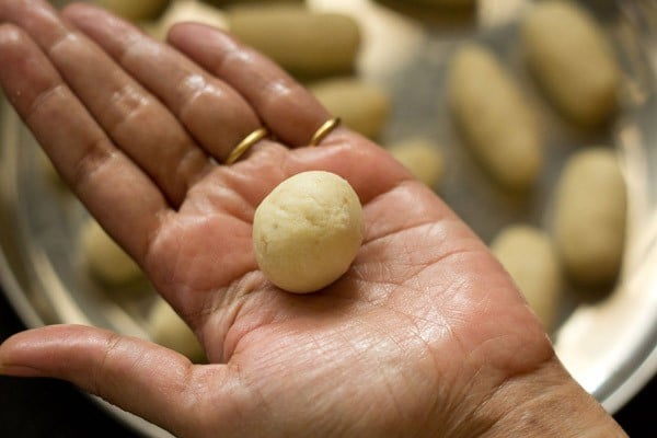 rolling jamun balls by hand.