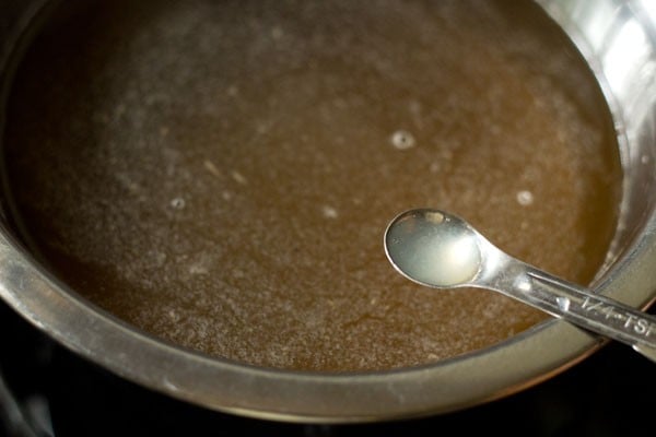 adding lemon juice to the sugar syrup.