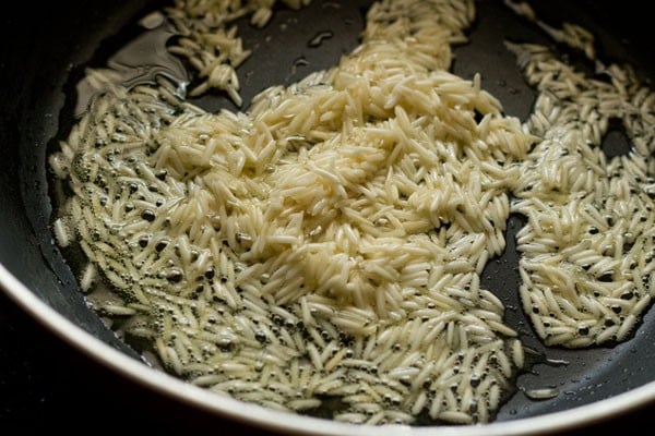 sautéing rice grains.
