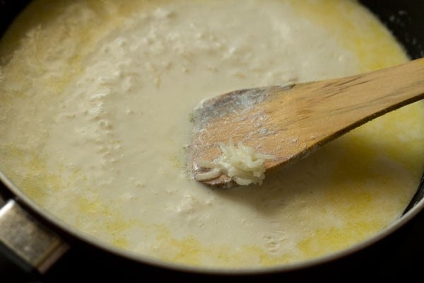 cooking rice grains in the milk. 