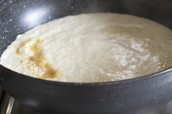 sugar added to the pot for the pumpkin payasam recipe.