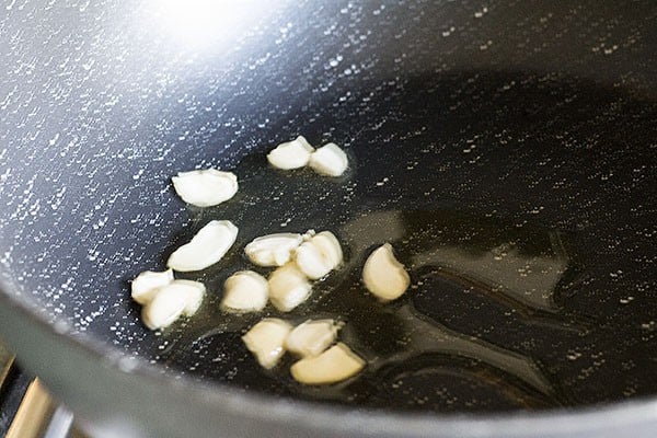 frying cashews for kaddu ki kheer recipe.