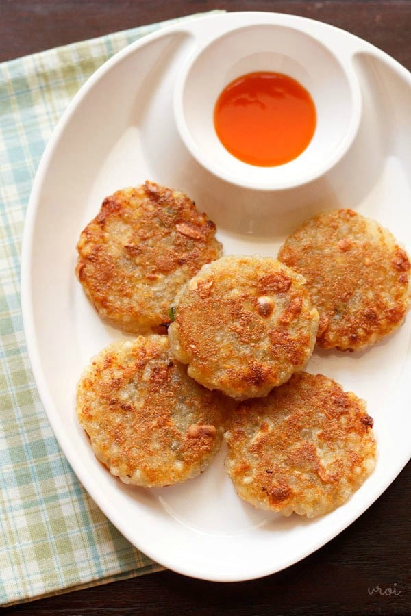 sabudana tikki served on a white plate with homemade tomato sauce