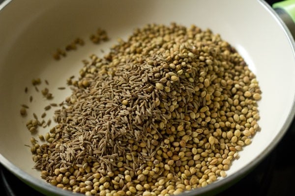 cumin and coriander seed in a pan for roasting