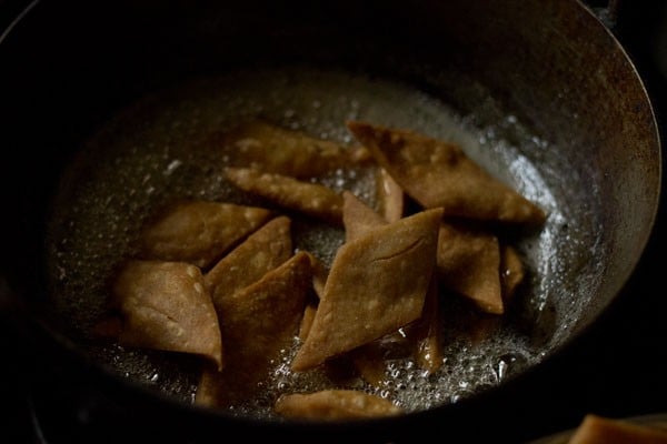 fried shakkarpara added to the prepared sugar syrup. 