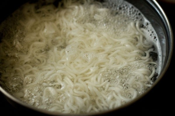 noodles cooking in boiling water