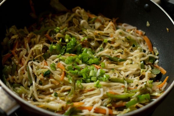 green onions added to spring roll filling