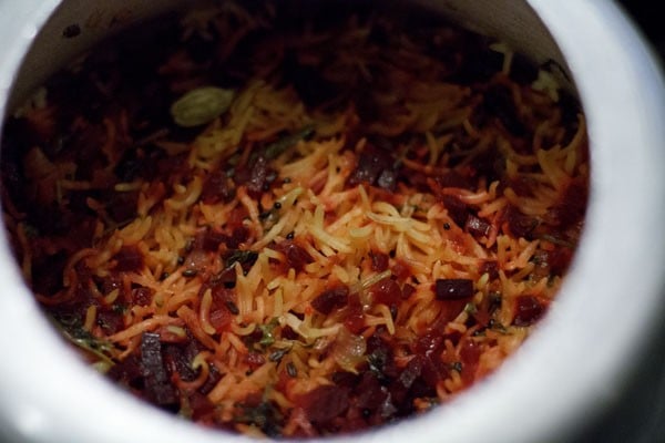 cooking beetroot rice. 