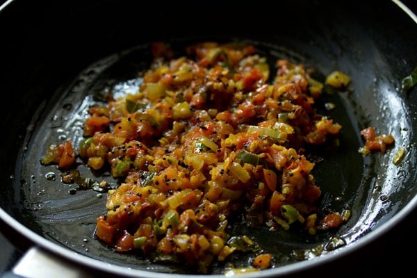 onion-tomato-spices mixture in the pan