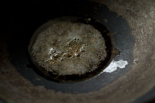 ajwain seeds in a kadai