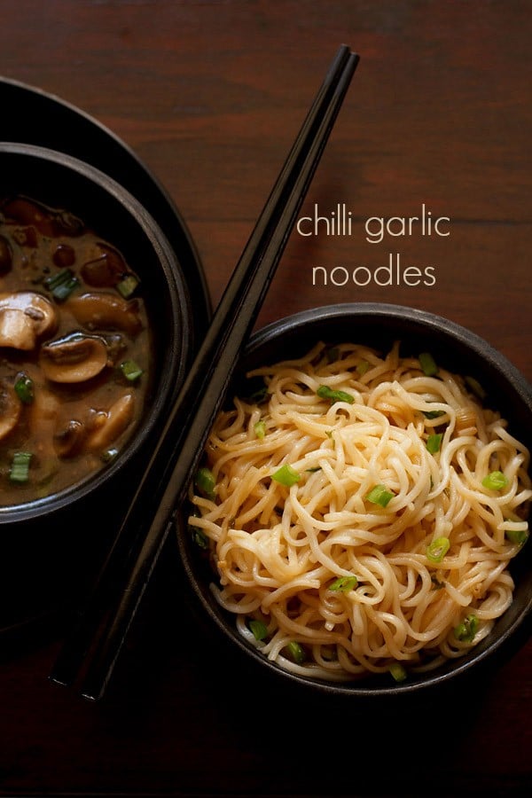 chilli garlic noodles served in a bowl with text layover.