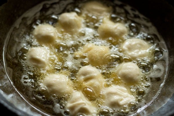 frying bhallas in hot oil. 