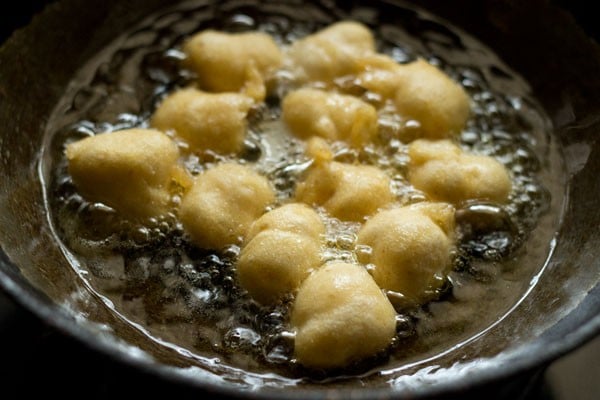 frying bhallas in hot oil. 