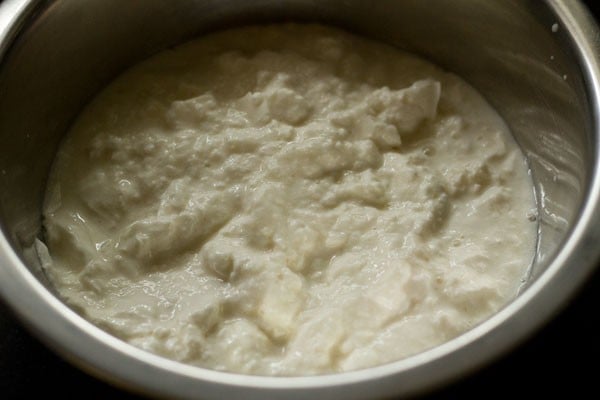 fresh chilled curd added in another bowl. 