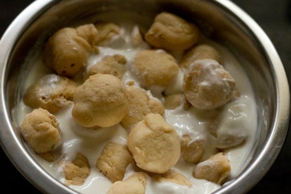 bhallas gently added to the beaten curd. 