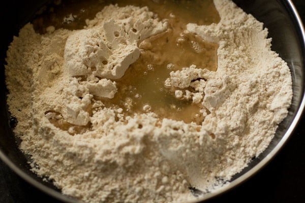 coconut oil added to the mixed ingredients in the bowl. 