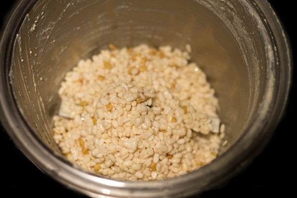 lentil-fenugreek seeds mixture added to grinder jar. 