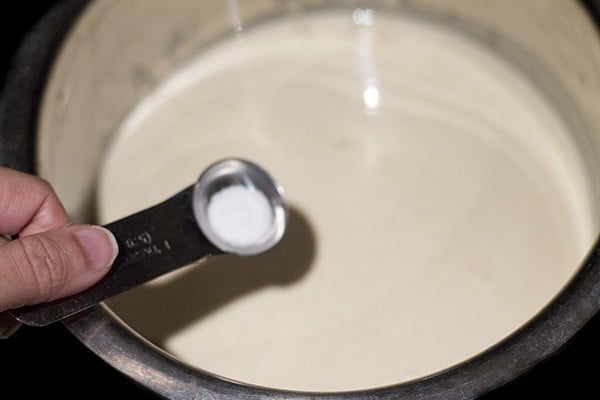 adding salt to the mixture of batters. 
