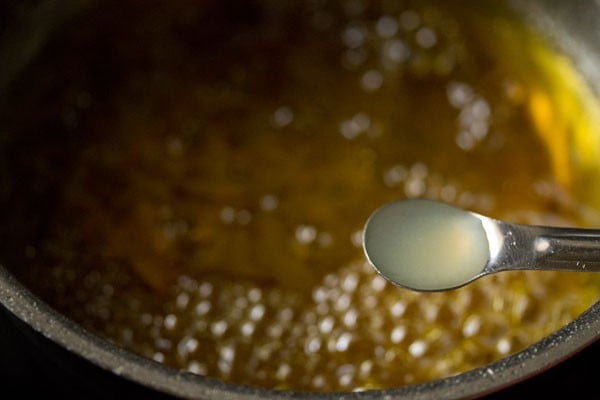 adding lemon juice to sugar syrup