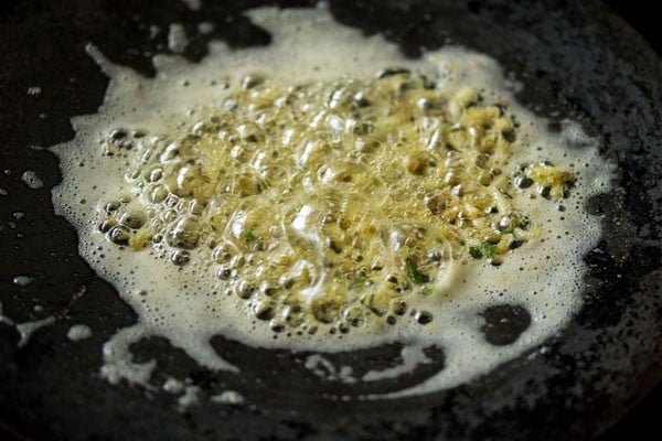 sautéing ginger-garlic-green chilies in butter. 