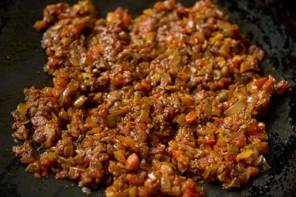 cooking onion-tomato mixture. 