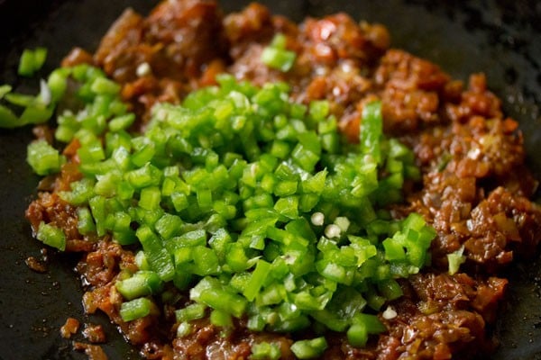 finely chopped capsicum added to the onion-tomato mixture. 