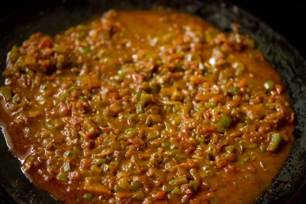 cooking the masala. 