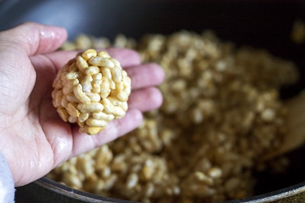 ladoo shaped from prepared puffed rice mixture. 