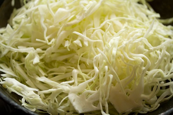 adding shredded cabbage