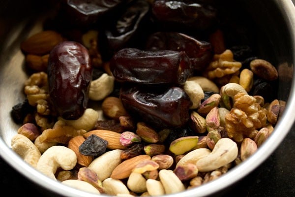 dry fruits and nuts in a steel bowl for chopping