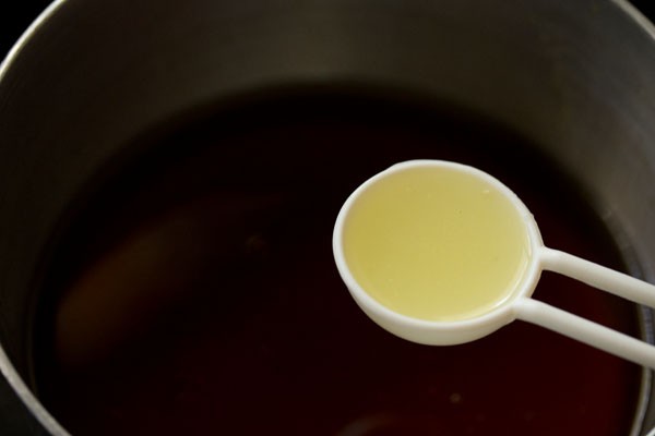 lemon juice being added to caramel