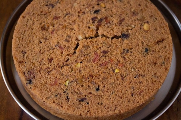 inverted kerala plum cake on a steel plate