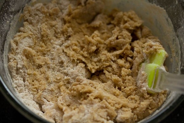 mixing dough with a spatula.