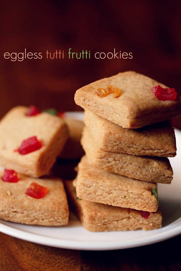 tutti frutti cookies served on a plate with text layover.