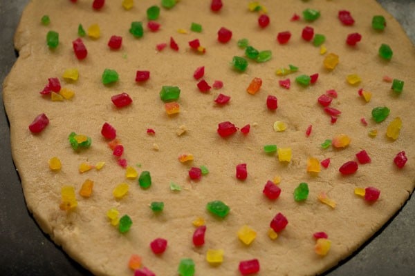 tutti frutti sprinkled on the rolled cookie dough. 