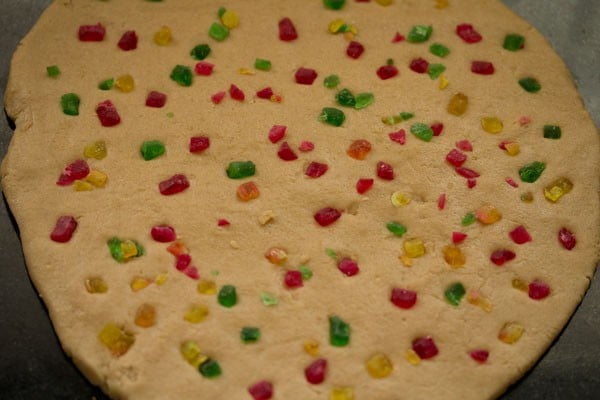 tutti frutti pressed on the rolled cookie dough. 