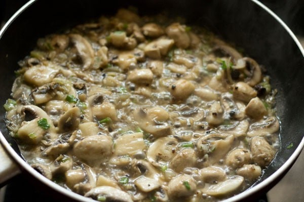 cooking mushrooms in the wok. 