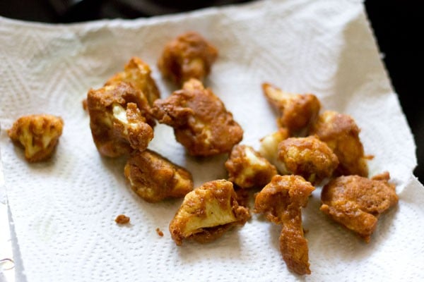 fried cauliflower on kitchen paper towels