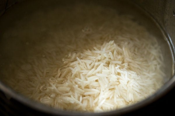 basmati rice added in the pan. 