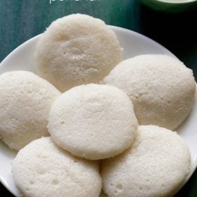 poha idli served on a white plate.