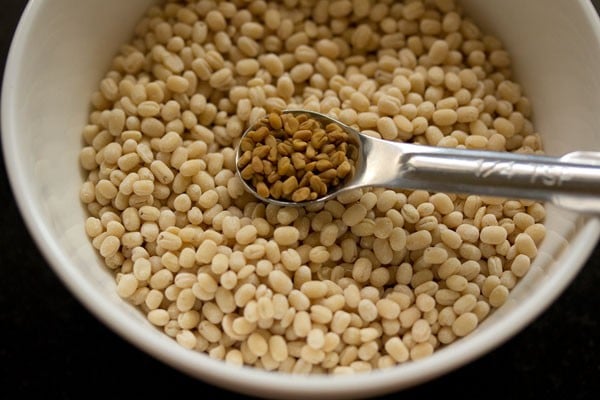 whole urad dal in a bowl