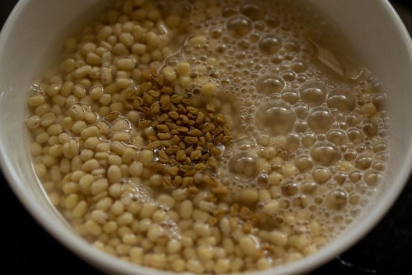 rinsing both the urad dal and methi seeds