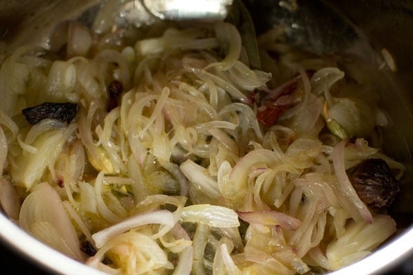 stirring and beginning to sauté onions. 