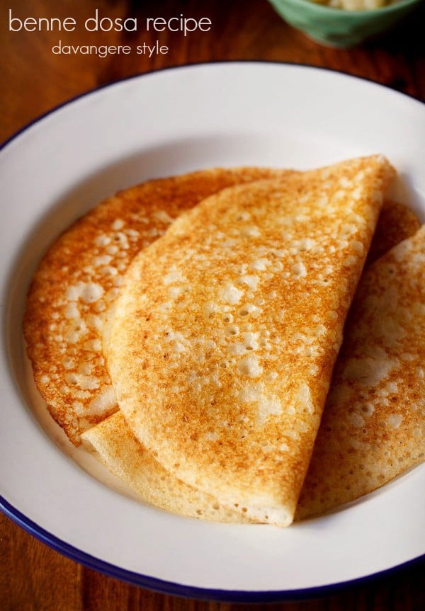 davangere benne dosa served on a blue rimmed white plate with text layover.