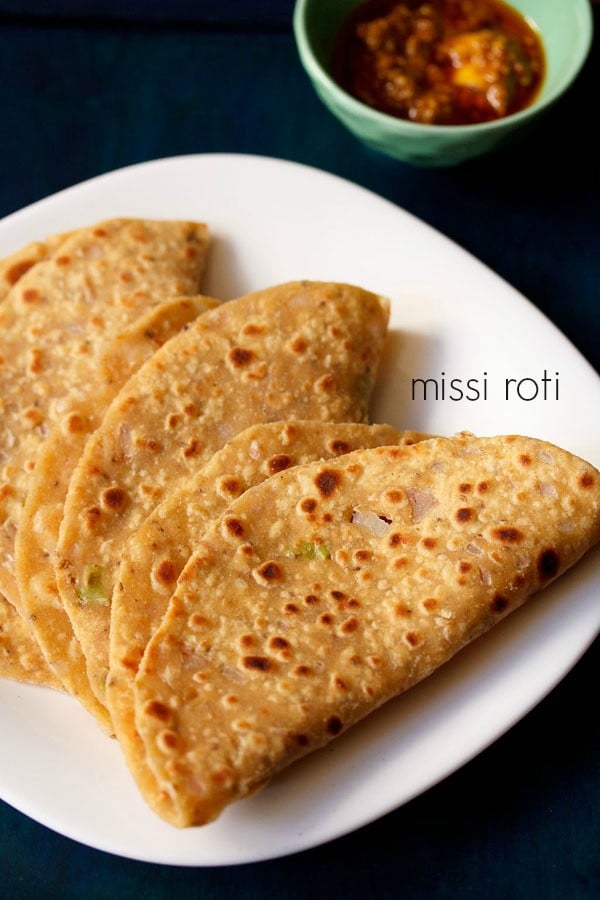 Punjabi missi roti served in a white plate
