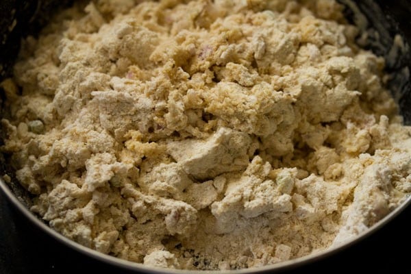 kneading dough in a bowl for making missi roti