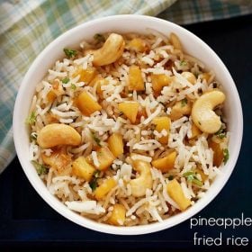 pineapple fried rice served in a white bowl.