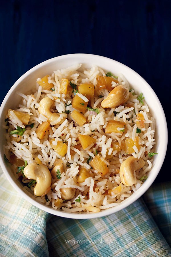 pineapple fried rice served in a bowl. 