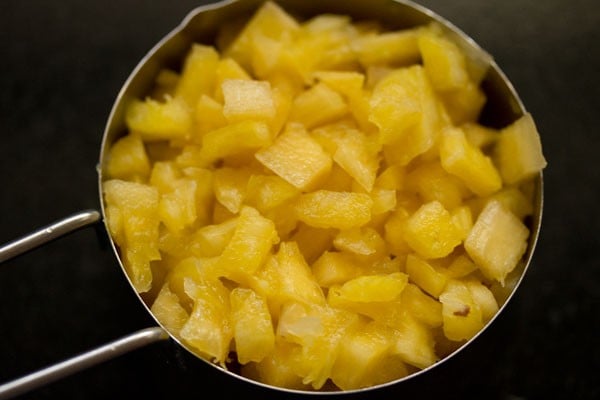 chopped pineapple cubes for pineapple fried rice. 